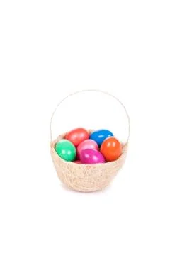 Easter colored eggs in the basket Stock Photos