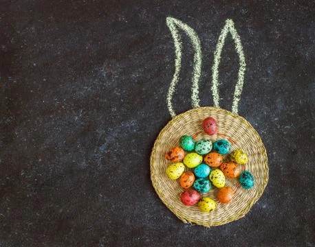 Easter colored eggs on a black background, concept Easter Stock Photos