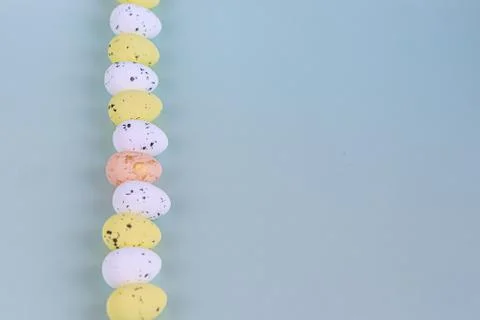 Easter, colored eggs on a light background, holiday background for your decor Фото