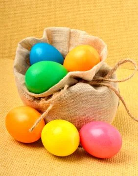 Easter colored eggs in the sack Stock Photos
