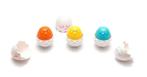 Easter colorful plastic eggs with chickens isolated Stock Photos