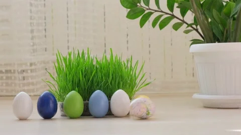 Easter colourful eggs rolling on wooden coating. Traditional Spring composition Video stock 151813636
