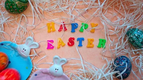 Easter composition with bunnies, Easter eggs and words "Happy Easter" Stock Footage 103851788