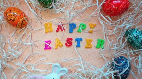 Easter composition with bunnies, Easter eggs and the words "Happy Easter" Stock Footage 103851940