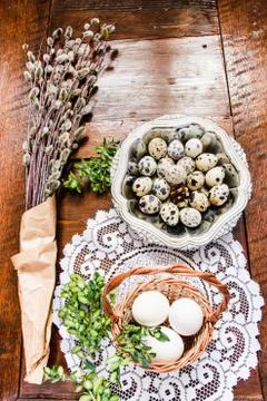 Easter composition of catkins, eggs and cress on wooden table Stock Photos