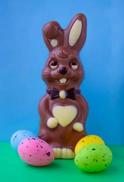 Easter composition chocholate rabbit with eggs Stock Photos