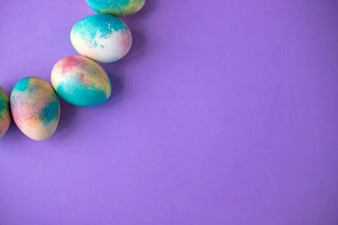 Easter composition with colorful eggs in shopping cart, wooden bunny and sp.. Stock Photos