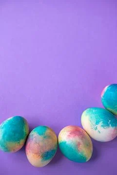 Easter composition with colorful eggs in shopping cart, wooden bunny and sp.. Stock Photos
