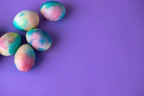 Easter composition with colorful eggs in shopping cart, wooden bunny and sp.. Stock Photos
