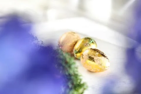 Easter composition with decorated eggs and shells. Stock Photos