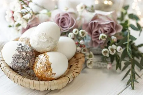 Easter composition with decorative eggs and flowers, close-up. Stock Photos