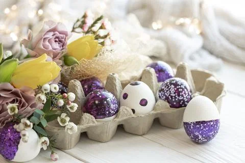 Easter composition with decorative eggs and flowers, close-up. Stock Photos