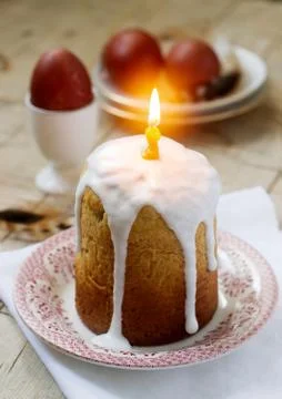Easter composition with Easter cake and Easter eggs on a wooden background. R Stock Photos
