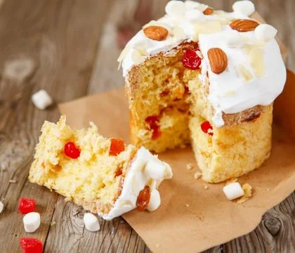 Easter composition. Easter cake on a rustic wooden background Stock Photos