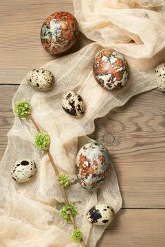 Easter composition - Easter eggs painted with natural dyes on a wooden table Stock Photos