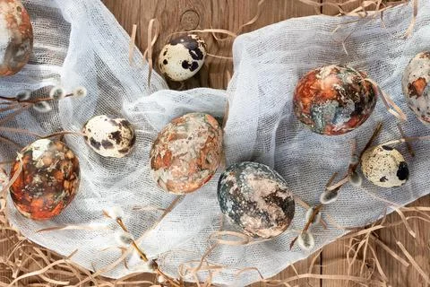 Easter composition - Easter eggs painted with natural dyes on a wooden table Stock Photos