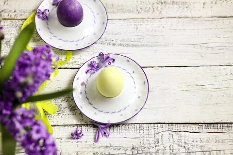 Easter composition with egg and egg cup with Hyacinth spring flowers on woode Stock Photos
