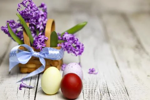 Easter composition with egg and Hyacinth spring flowers on wooden background Stock Photos