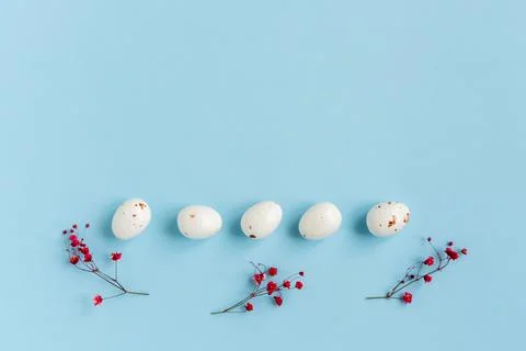 Easter composition with eggs and flowers. Stock Photos
