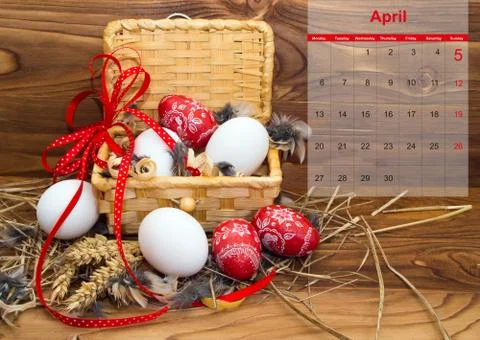 Easter composition with eggs  in a basket with a calendar for april 2015. Stock Photos