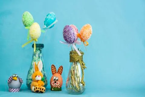 Easter composition with eggs on a blue background Stock Photos