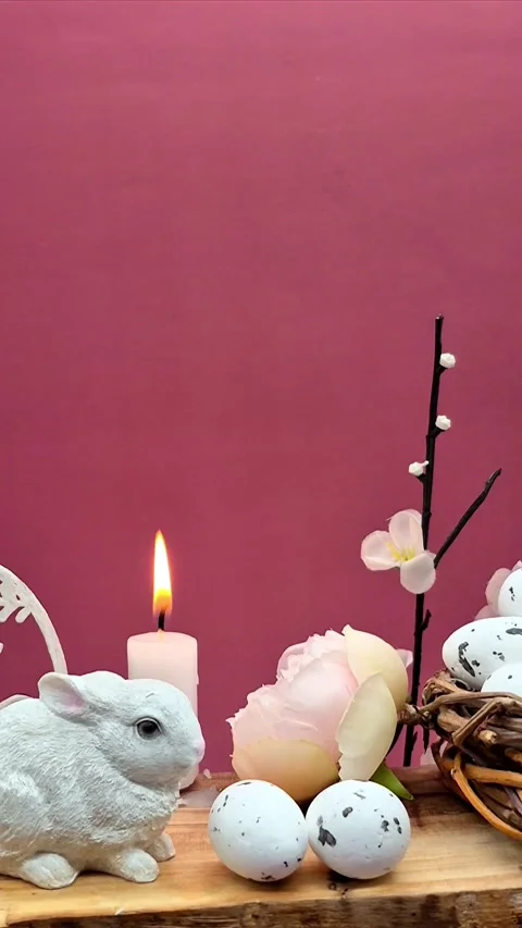 Easter composition with eggs, candle and bunny Video stock 304669257