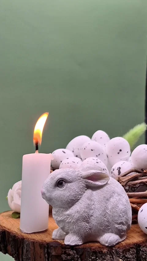 Easter composition with eggs, candle and bunny Video stock 304758866