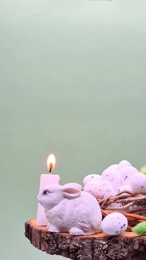 Easter composition with eggs, candle and bunny Stock Footage 304758868