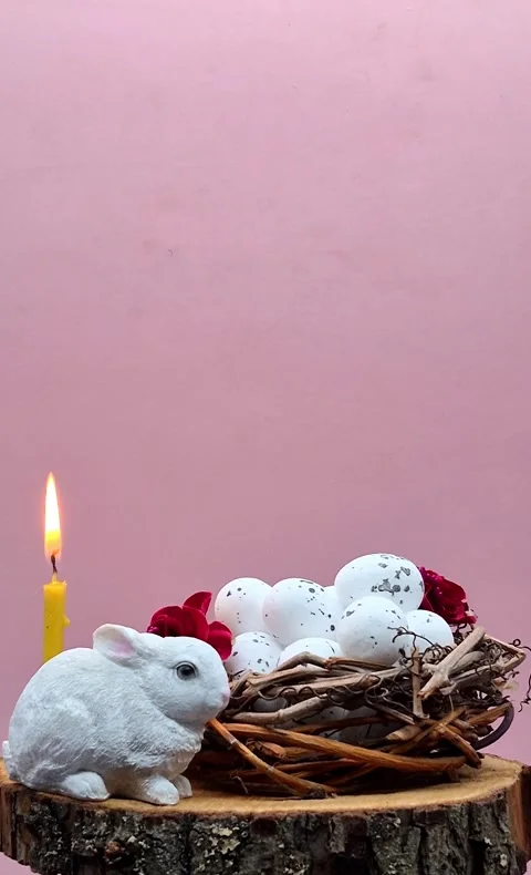 Easter composition with eggs, candle and bunny Video stock 304758876