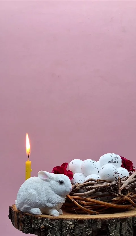 Easter composition with eggs, candle and bunny Stock Footage 304758883