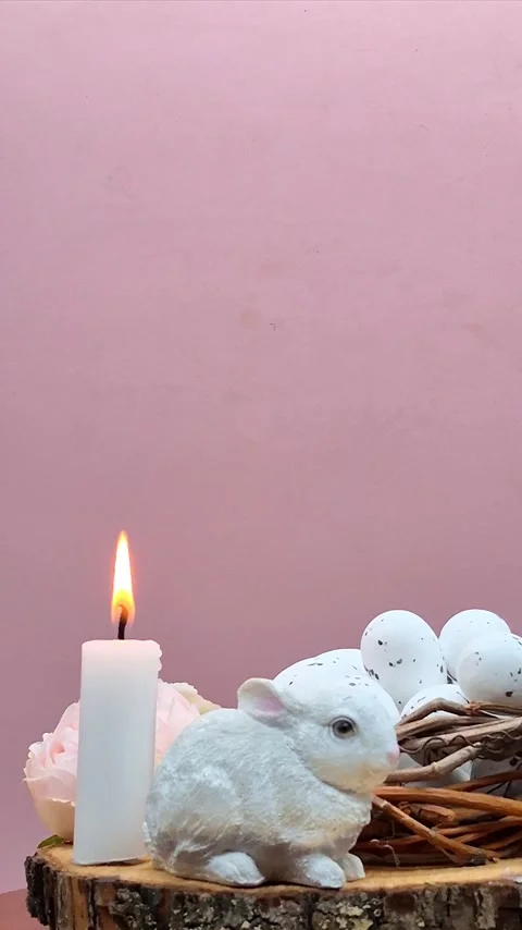 Easter composition with eggs, candle and bunny Stock Footage 304758903