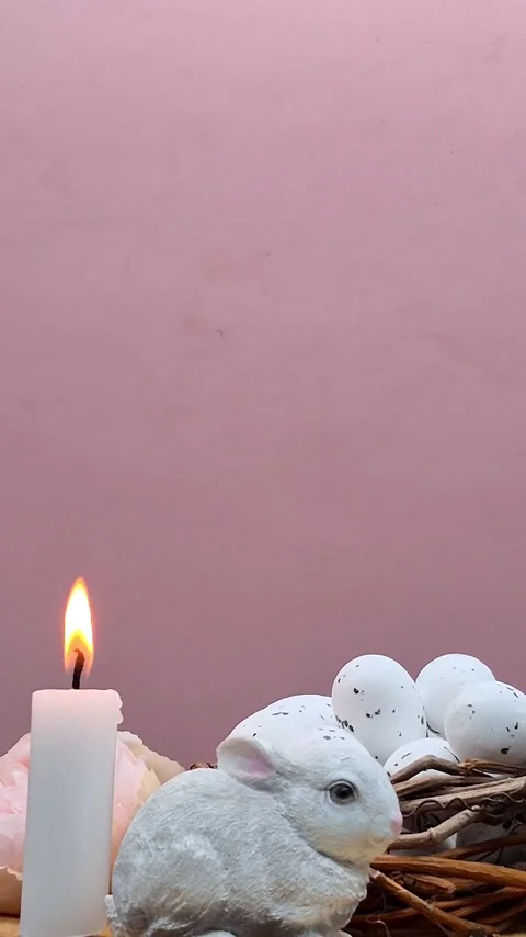 Easter composition with eggs, candle and bunny Stock Footage 304758917