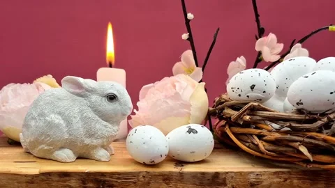 Easter composition with eggs, candle and bunny Stock Footage 304758921