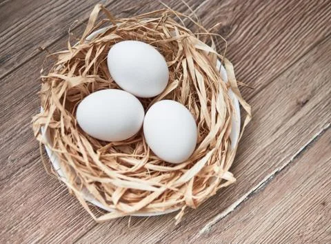 Easter composition with eggs on wooden background, space for text Stock Photos