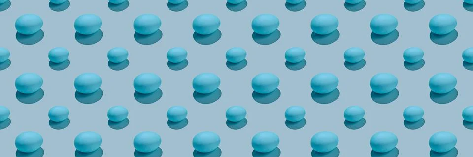 Easter composition pattern in blue shades. Painted eggs on a blue background. Stock Photos