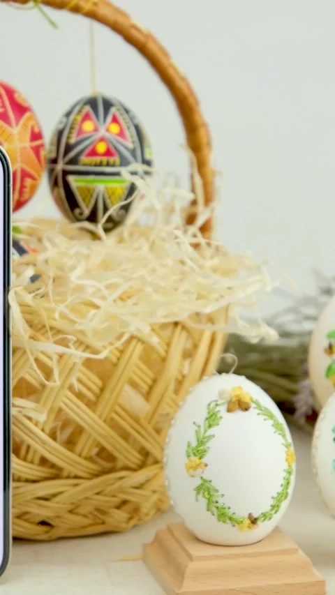 Easter composition with phone with white chroma key screen for advertising Stock Footage 247365310