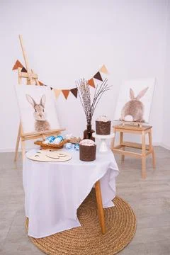 Easter composition with traditional cake and painted eggs on table. Festive Stock Photos