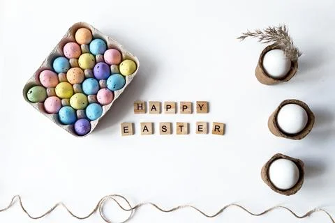 Easter concept with colored and white eggs on a white background. Happy Easte Stock Photos