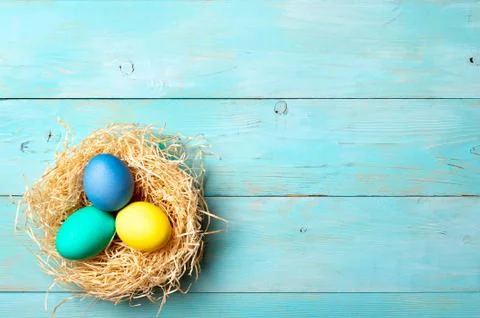 Easter concept, copy space, top view, blue wood 스톡 사진
