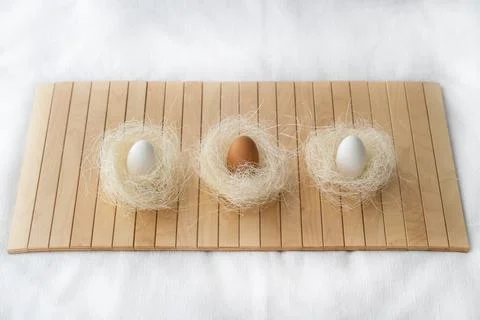 Easter concept. Easter decoration with eggs in natural color on a bamboo mat Stock-Fotos