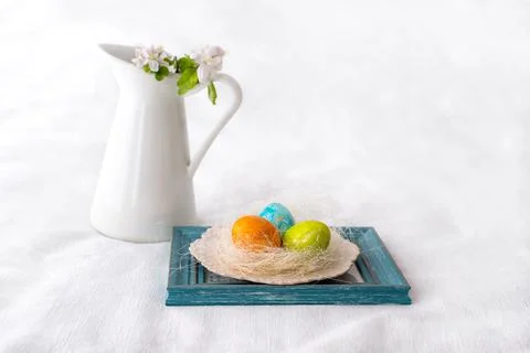Easter concept. Easter decoration with painted and unpained easter eggs Stock Photos