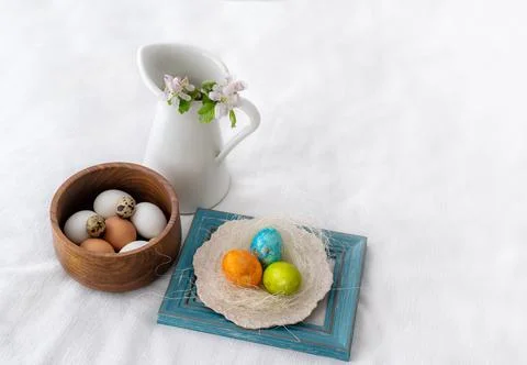 Easter concept. Easter decoration with painted and unpained easter eggs Stock Photos