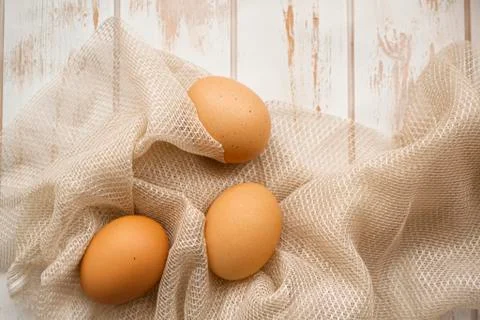 Easter concept - fresh brown eggs on shabby wooden teble Foto stock