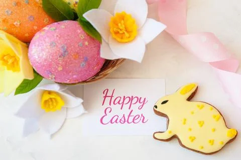 Easter concept. gingerbread and basket with eggs. Stock Photos
