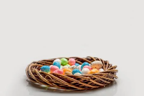 Easter concept. wreath with easter eggs on a light background Stock Photos
