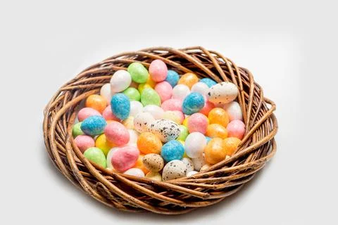 Easter concept. wreath with easter eggs on a light background Stock Photos