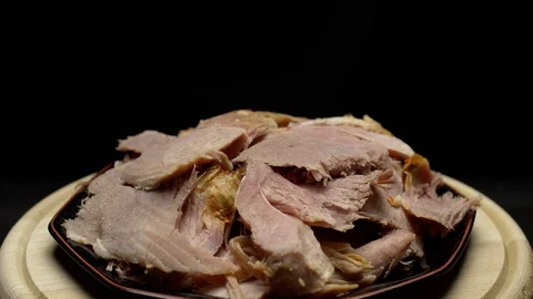 Easter cooked ham sliced on a plate Stock Footage 106754816
