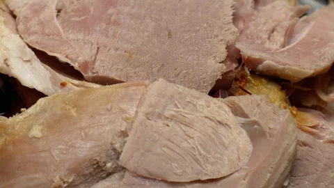 Easter cooked ham sliced on a plate Stock Footage 117343939