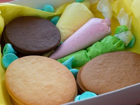 Easter cookie decorating kit featuring egg-shaped cookies and vibrant icing Stock Photos