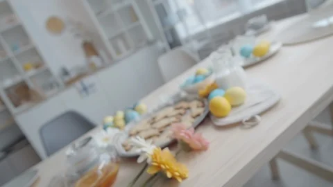 Easter Cookies and Eggs on Kitchen Table Stock Footage 125010909